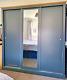 3 Door Sliding Charcoal & Oak Wardrobe / Full Length Central Mirrored Door