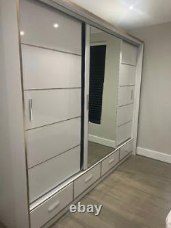Brand new large luxury white gold silver sliding wardrobes (pick up only)