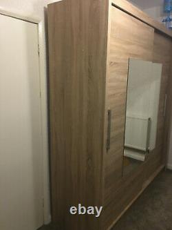 Double sliding door wardrobe light oak mirror 2 meters wide