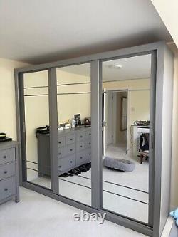 Grey Triple Wardrobe with sliding mirror doors