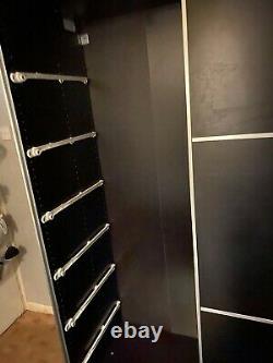 IKEA Pax double wardrobe with sliding mirrored doors panelled