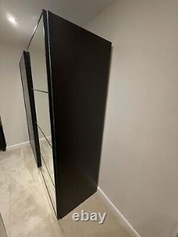 Ikea PAX Wardrobe sliding doors. Black/brown mirror door. 201Hx200Wx63cmD