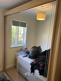 Large sliding door double wardrobe with mirrored doors
