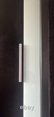 Mirrored double wardrobe with sliding doors used