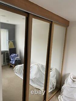 Mirrored sliding door wardrobe