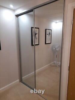 Pair of mirror sliding wardrobe doors
