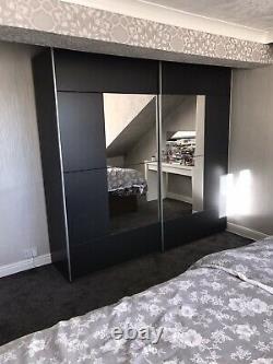 Rauch Sliding Door Wardrobe, Metallic Grey & White German Bedroom Furniture