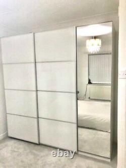 Triple IKEA PAX Wardrobe With Sliding Doors And Mirrored Hinged Door