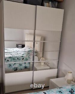 Wardrobe with 2 mirrored sliding doors in White Matt with rails and shelves